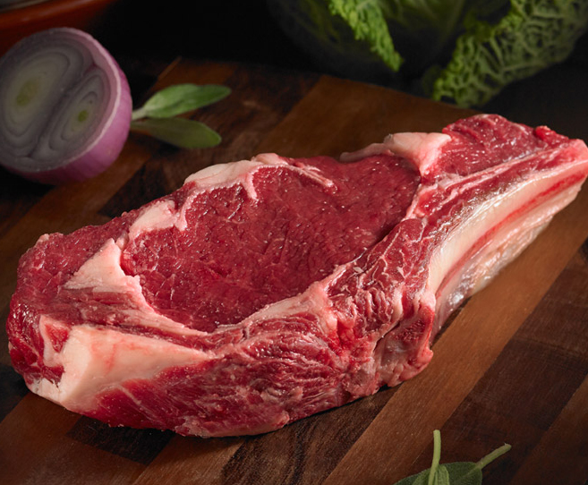 raw bison rib steak 
