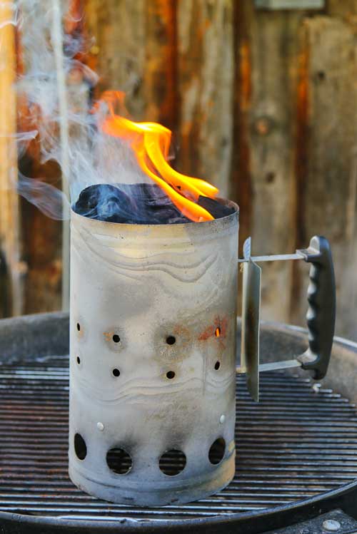 Chimney starter for charcoal barbecue