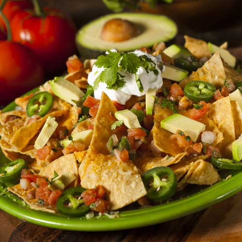 Nachos with avocado, jalapena peppers and ground elk